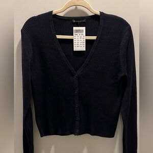 Brandy Melville Navy Blue knit v-neck cardigan
Brand new with tags
